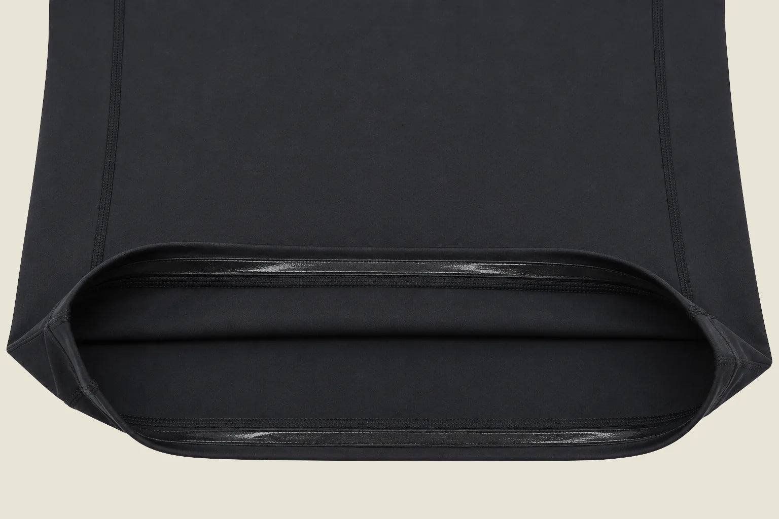 Actual product detail showing the silicone strip inside V1's hem